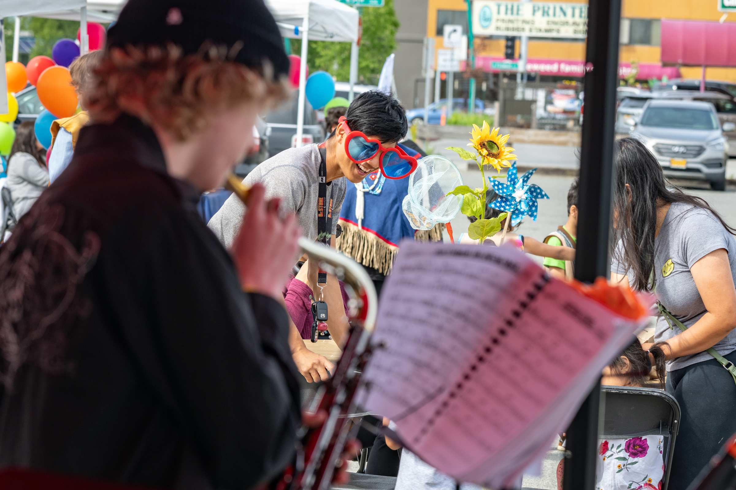 musician playing in front of fun crowd